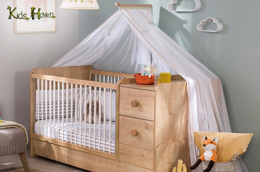 Wooden convertible baby bed with storage