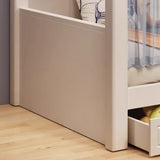 Close-up view of the lower bunk and storage drawers of the spaceship-themed full-height bunk bed