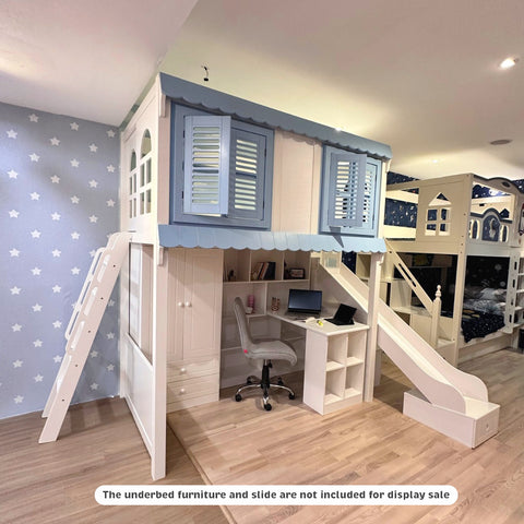 Children's bedroom with a playhouse-style bed, desk, and slide.